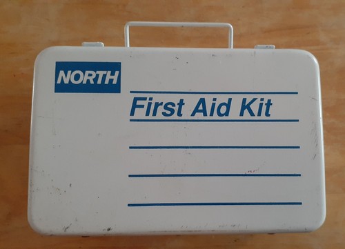Vintage north first aid kit - aid,